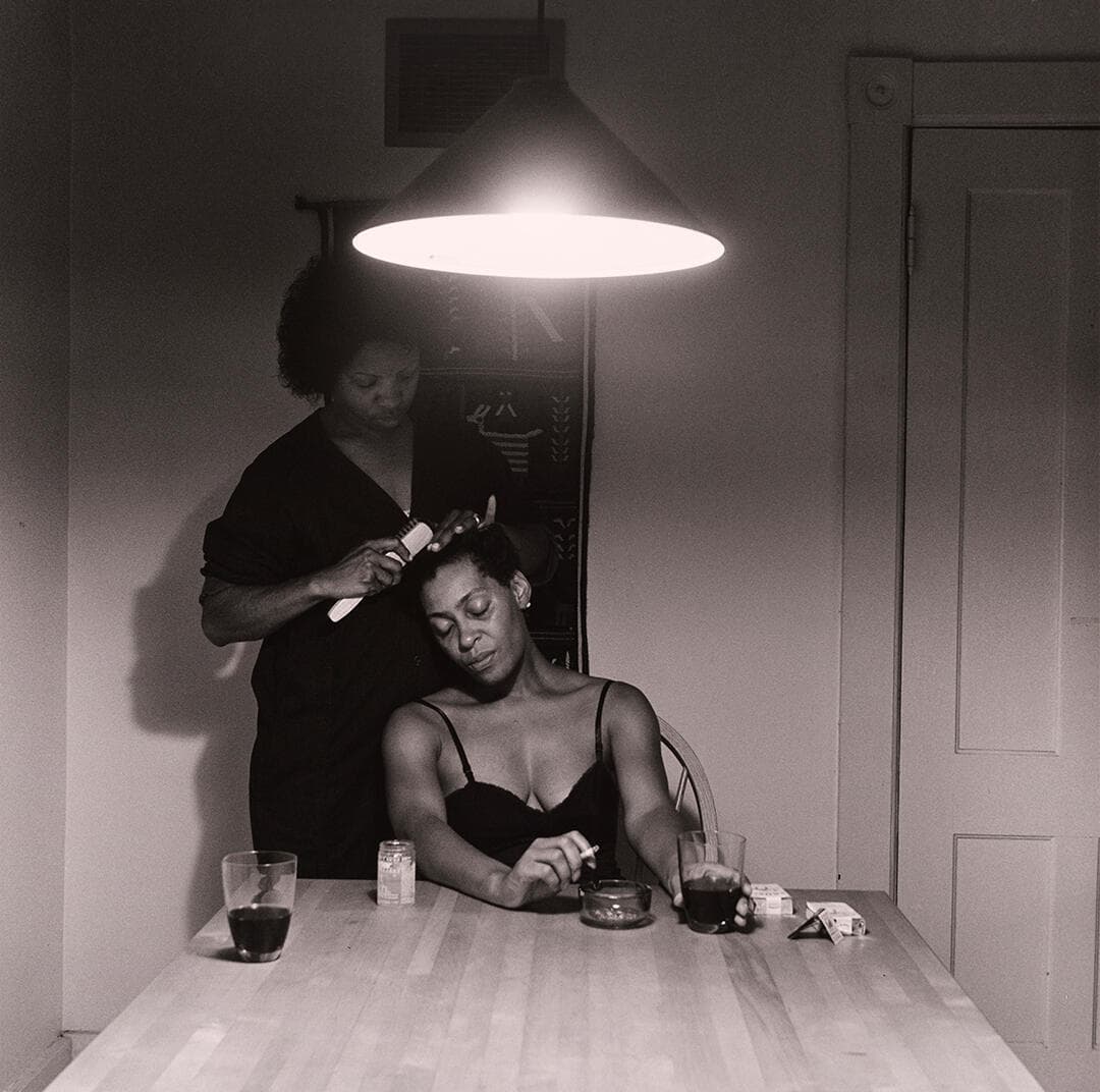 Untitled (Woman brushing hair)