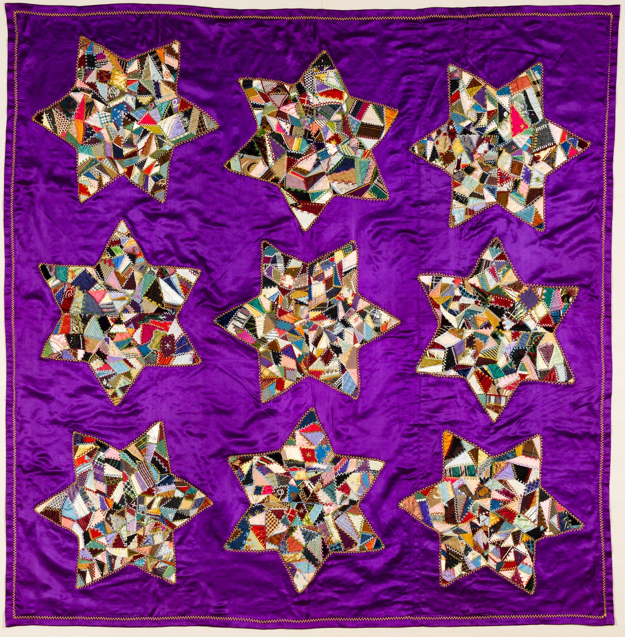 McAllister Family, Show Quilt with Contained Crazy Stars, 1885-1920, silks, including satin, 55 in. x 54 1/2 in. American Folk Art Museum, Gift of Eleanor Knapp, 2007.9.1.
