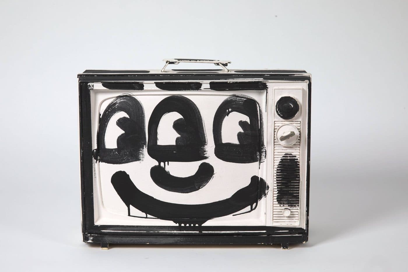 Keith Haring, Untitled (black and white TV), 1986, acrylic paint on television, 20 in. x 28 in. x 14 in. Collection of Larry Warsh. © Keith Haring Foundation.